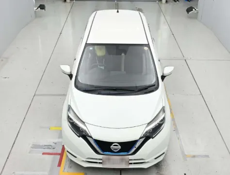 2017 Nissan Note e-Power X white hatchback, front three-quarter view, in transit from Japan.