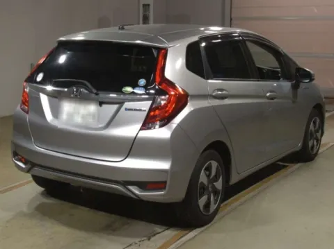 Rear view of a silver 2019 Honda Fit Hybrid hatchback, a Japanese import, offered by Car Collection pty ltd.