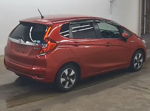 2017 Honda Fit Hybrid red hatchback, front seat area view