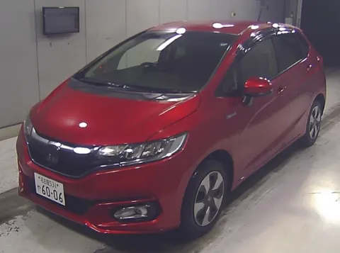 Interior of a 2018 Honda Fit Hybrid, automatic transmission, red exterior, at Car Collection.