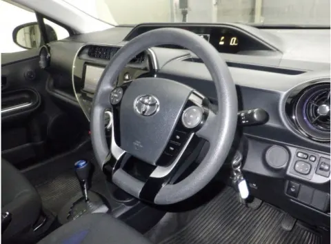 Side profile of silver Toyota Aqua 2018 S Grade