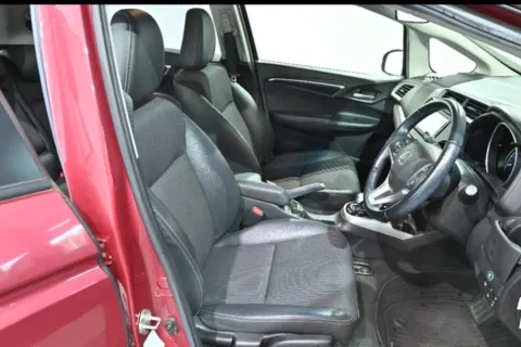 Honda Fit Hybrid 2018 hatchback in pink, interior dashboard view, in Musina.