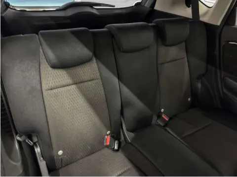 Front seat area of a silver 2019 Honda Fit Hybrid, a Japanese import with 163,000 km, available near Musina.