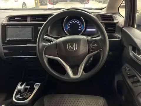 Interior dashboard of a 2019 Honda Fit Hybrid, silver exterior, fresh import from Japan, at Car Collection pty ltd.