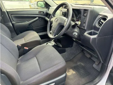 Interior of 2017 Toyota ProBox GL showing dashboard and seats, with power windows and LCD screen.